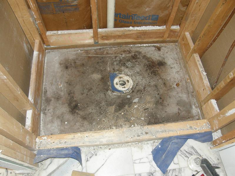 07 Shower Removed, Leaving Mold Stains on Concrete.JPG